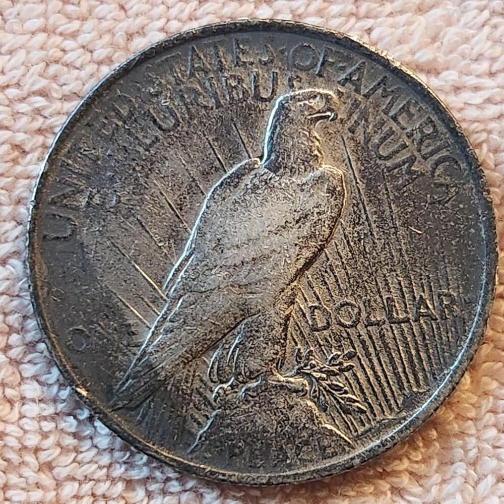 This 1923 United States Peace Silver Dollar....
